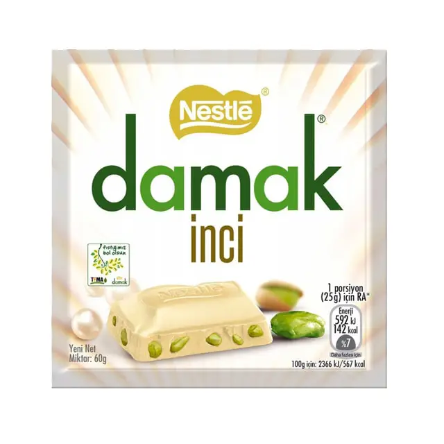 Nestle-Damak-white-Chocolate شکلات سفید شیری با مغز پسته داماک نستله